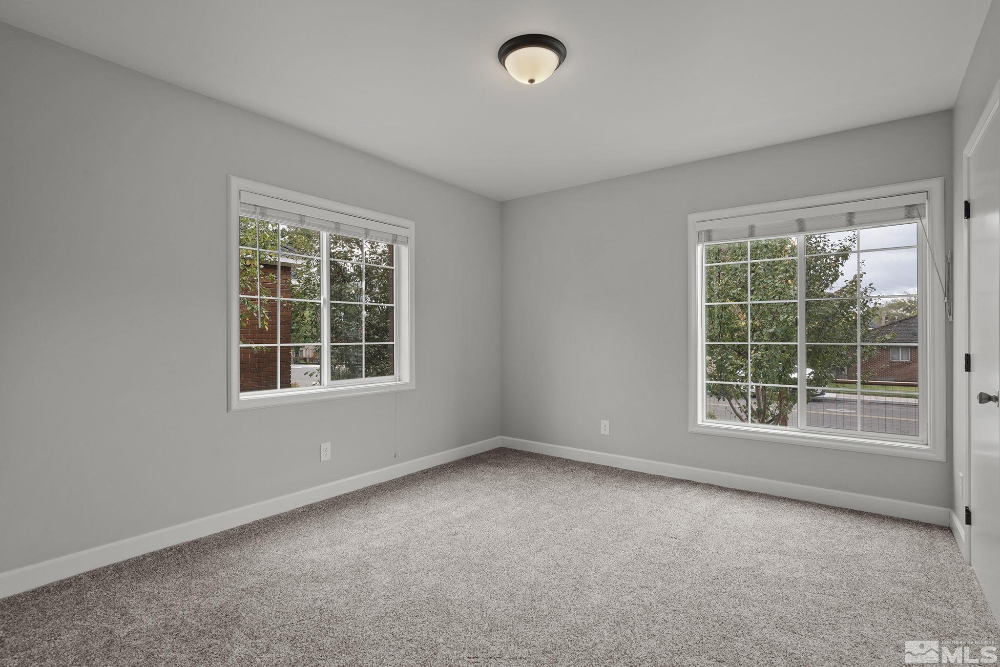 701 Stewart Street Reno, NV 89502 - Photo 13 of 40 an empty room with a window