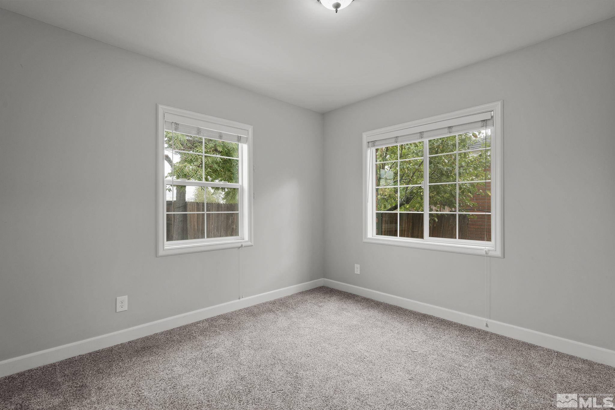 701 Stewart Street Reno, NV 89502 - Photo 14 of 40 an empty room with a window