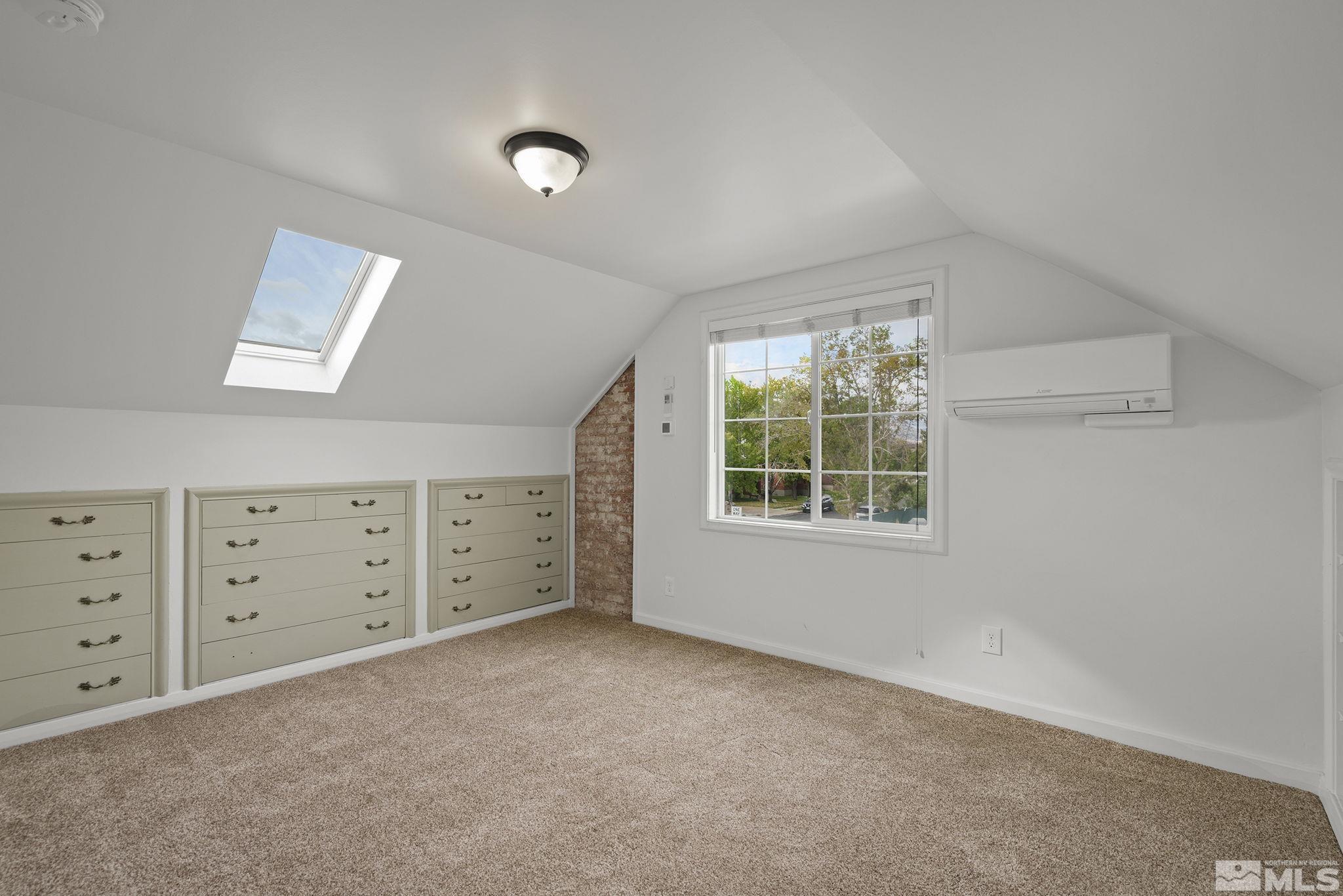 701 Stewart Street Reno, NV 89502 - Photo 20 of 40 a view of room with window and dresser