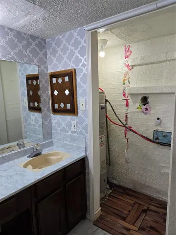 a bathroom with a toilet bathtub and shower