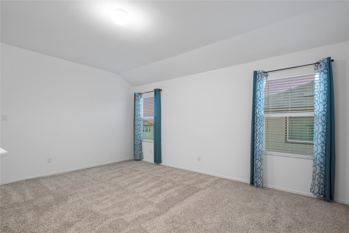 148 Rowdy Yates Way Jarrell, TX 76537 - Photo 21 of 39 a view of an empty room and window