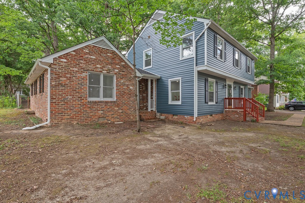 11840 Winfore Drive Midlothian, VA 23113 - Photo 35 of 40 Two-story dwelling featuring blue siding and a red