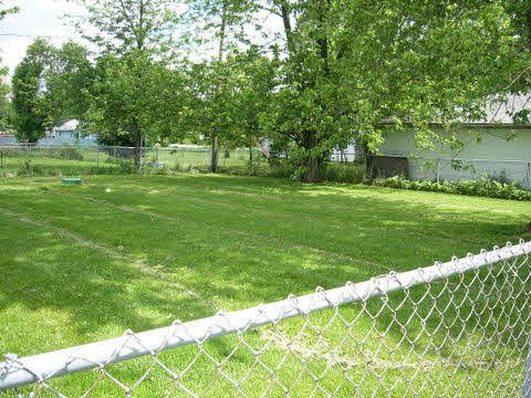 11055 East Fisher Road Rochelle, IL 61068 - Photo 2 of 5 a garden view with a sitting space