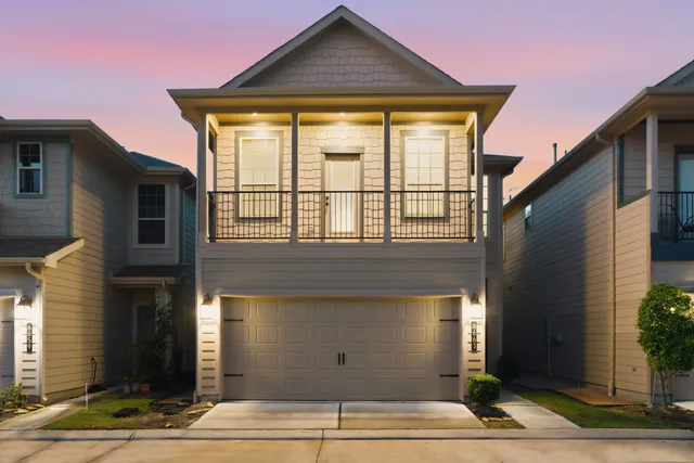 a view of a house with a garage