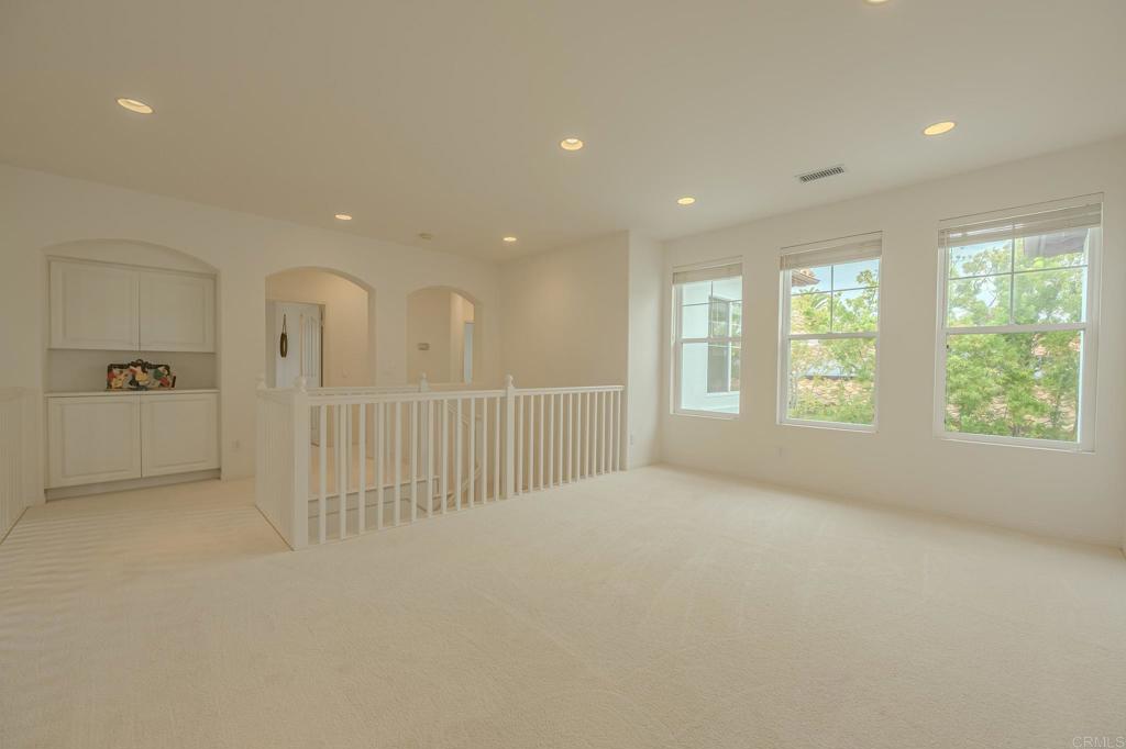 1370 Cassins Street Carlsbad, CA 92011 - Photo 17 of 35 a view of an empty room with a window