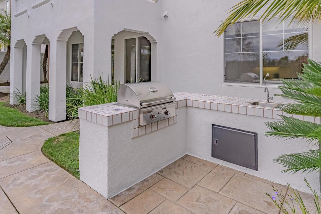 1370 Cassins Street Carlsbad, CA 92011 - Photo 27 of 35 a view of storage and utility room with washer and dryer