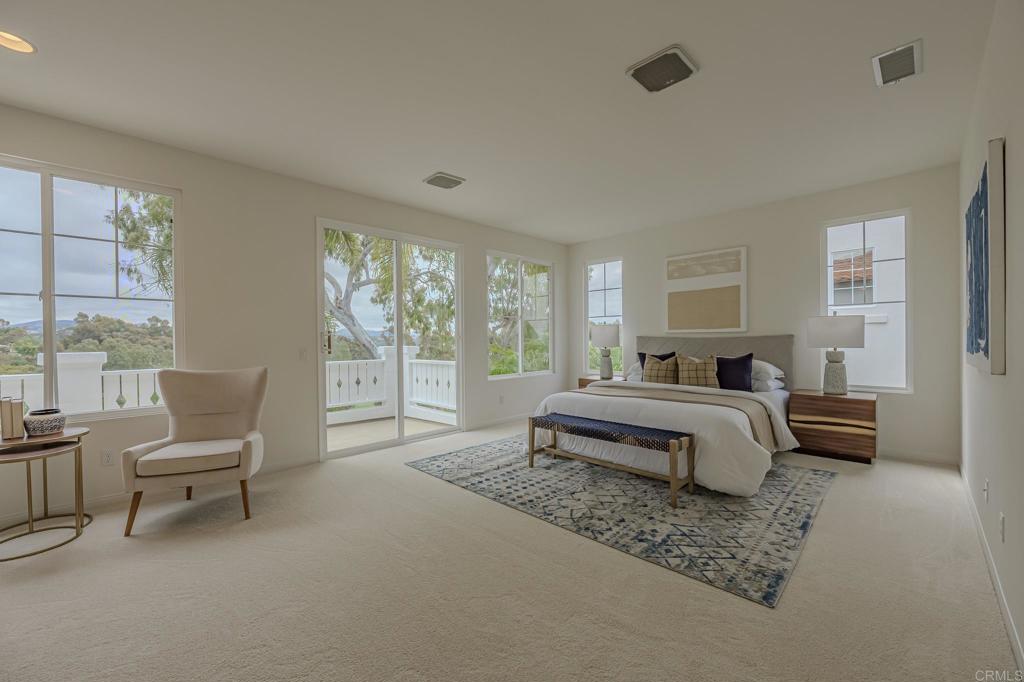 1370 Cassins Street Carlsbad, CA 92011 - Photo 5 of 35 a spacious bedroom with a bed and large window