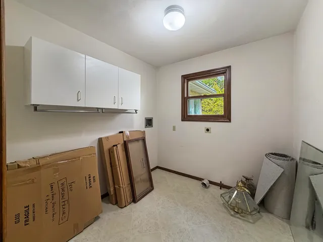 a view of room with cabinets