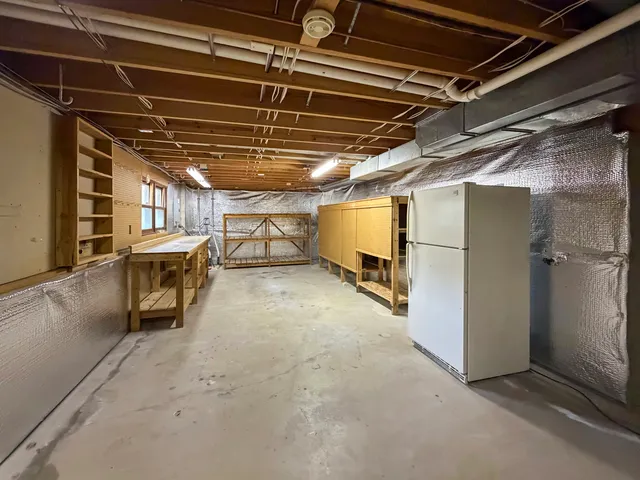 a view of an empty room with a garage