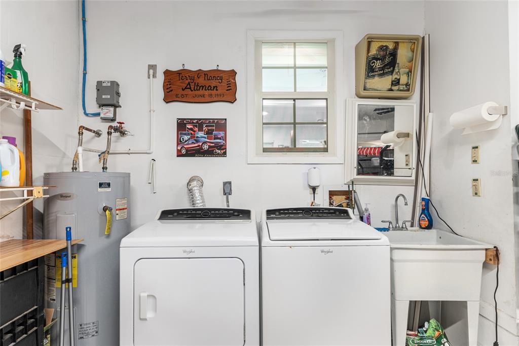 8889 Southwest 96th Street, Unit E Ocala, FL 34481 - Photo 40 of 40 a view of kitchen with washer and dryer