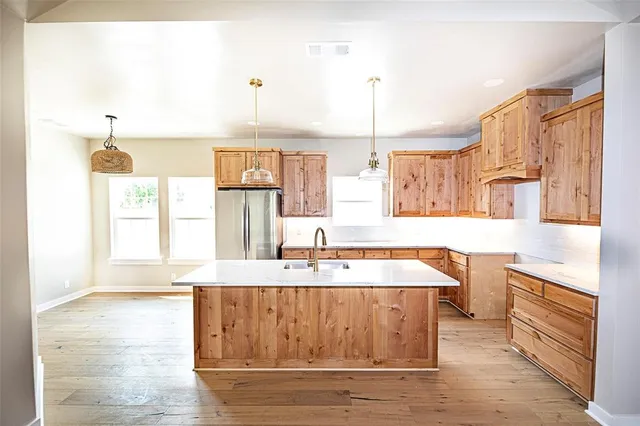 a bathroom with a tub sink and a mirror