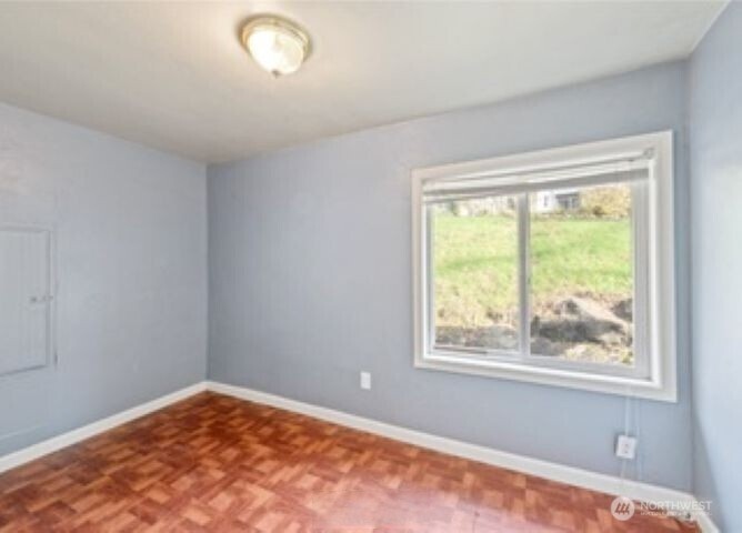 10601 55th Avenue South Seattle, WA 98178 - Photo 24 of 26 a view of empty room with window