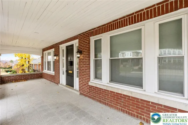 a view of a house with a porch