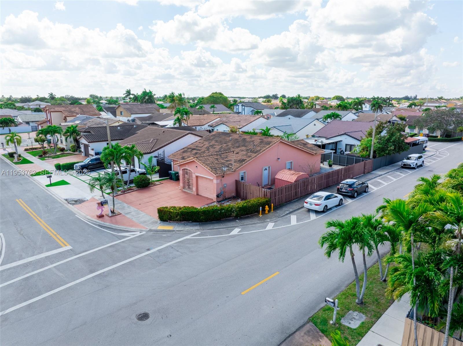 1002 Southwest 142nd Court Miami, FL 33184 - Photo 35 of 50 an aerial view of a houses with a street