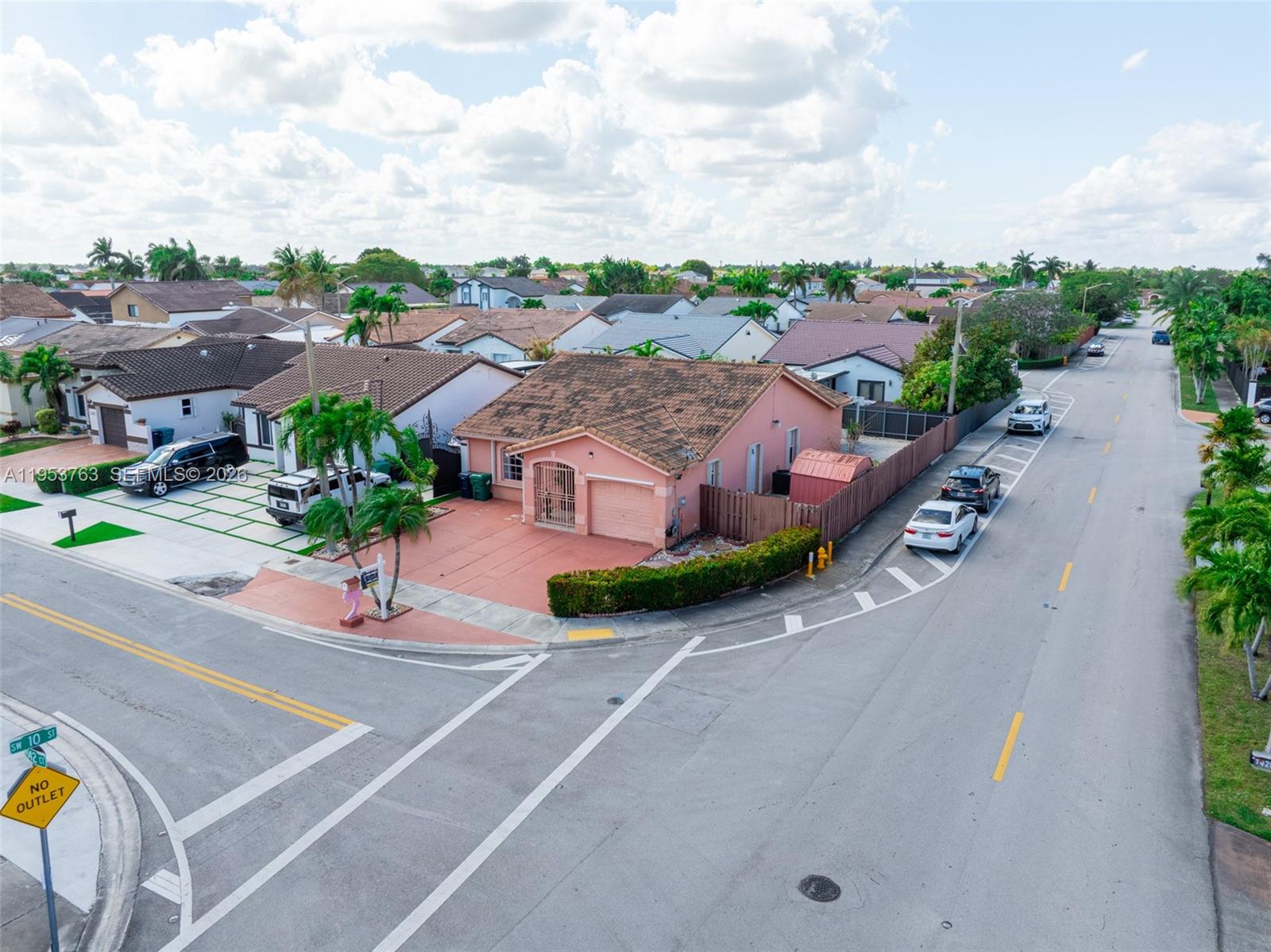 1002 Southwest 142nd Court Miami, FL 33184 - Photo 36 of 50 an aerial view of a house with a garden space and street view