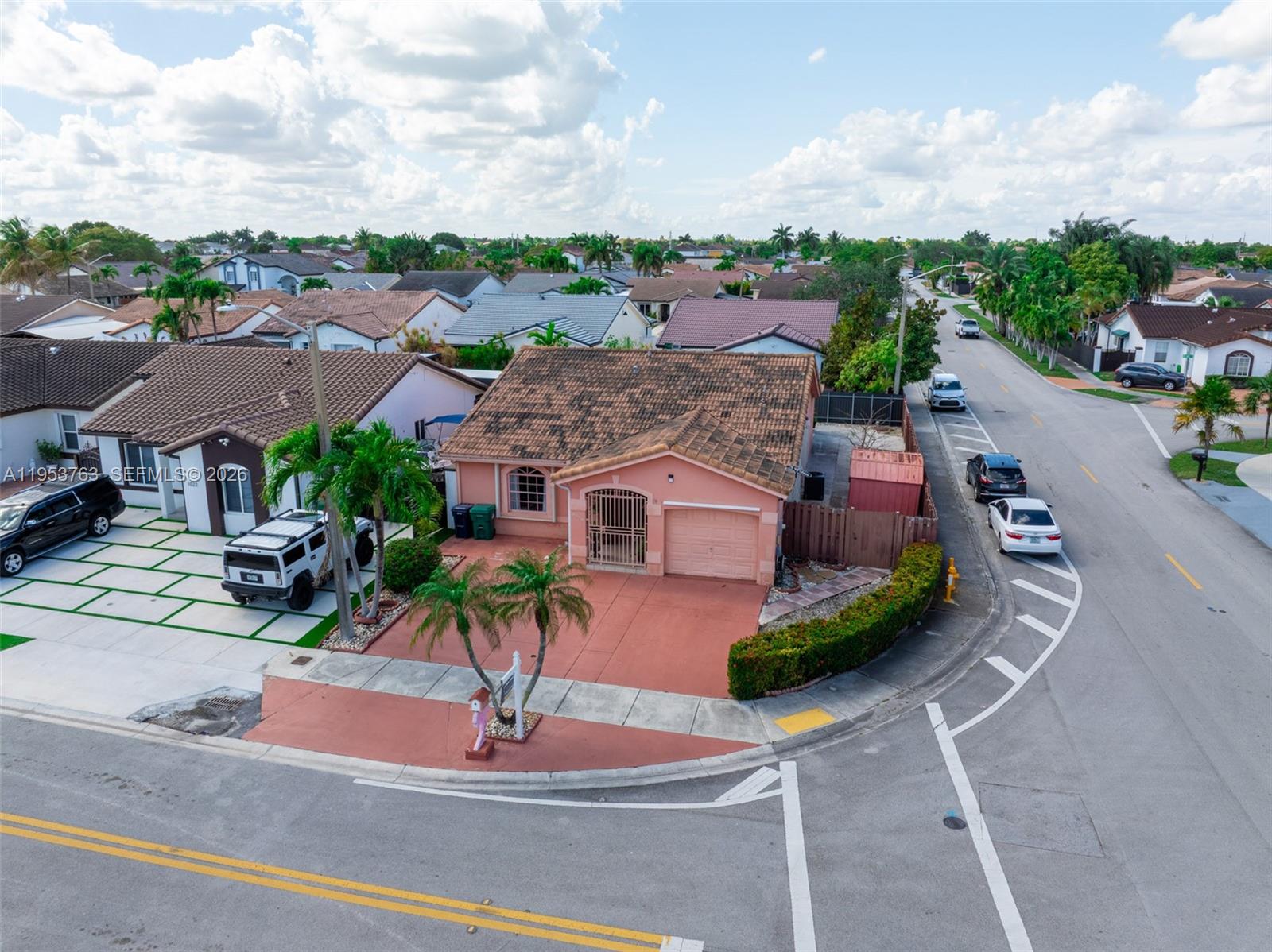 1002 Southwest 142nd Court Miami, FL 33184 - Photo 37 of 50 an aerial view of a house with garden space and street view
