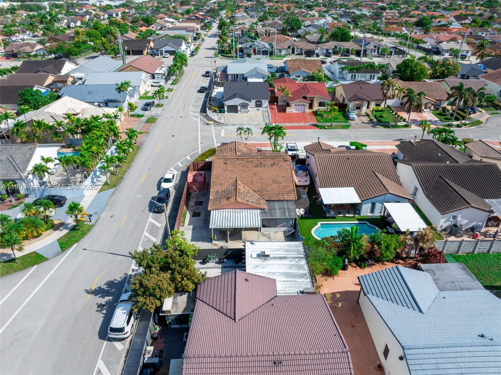 1002 Southwest 142nd Court Miami, FL 33184 - Photo 45 of 50 an aerial view of a houses with yard