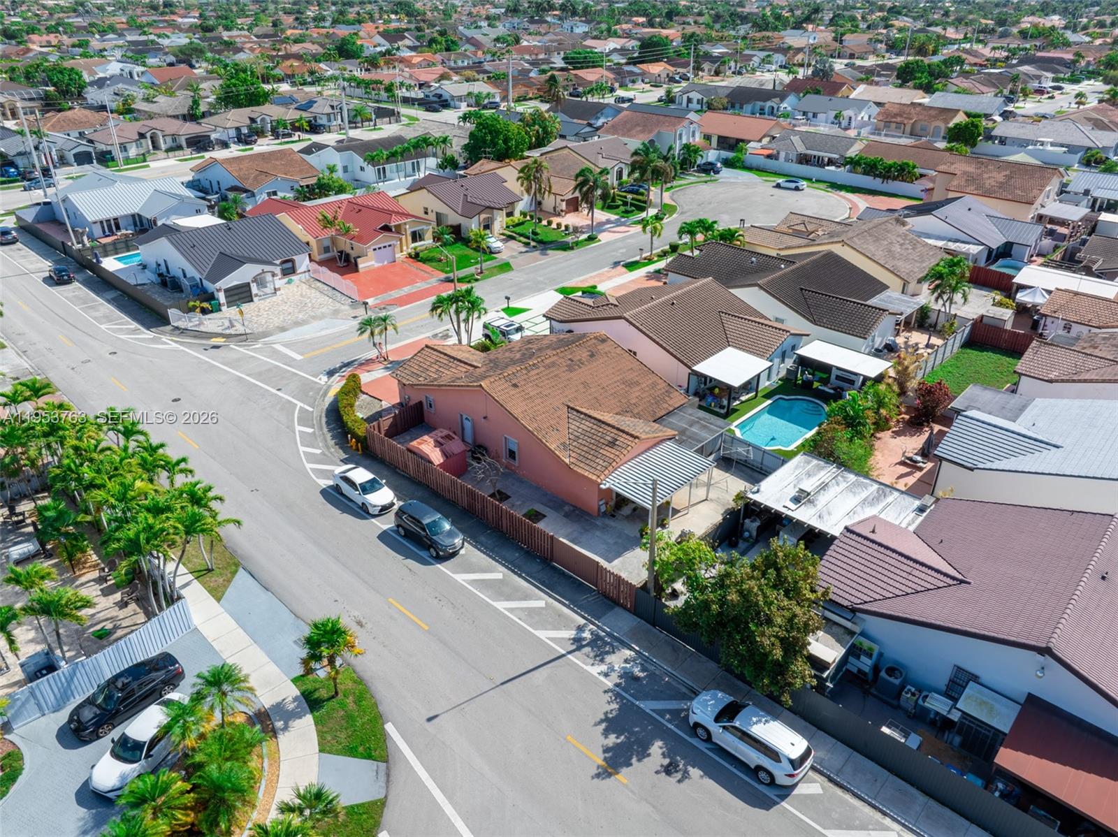 1002 Southwest 142nd Court Miami, FL 33184 - Photo 46 of 50 an aerial view of a city with streets and houses