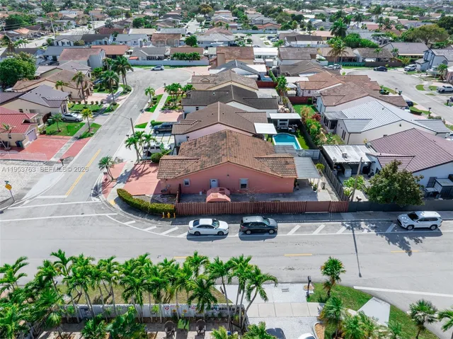 an aerial view of a city with lots of residential buildings