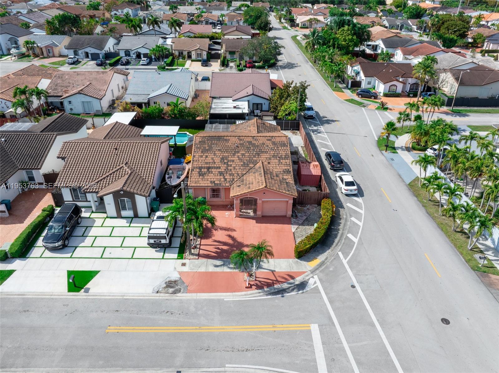 1002 Southwest 142nd Court Miami, FL 33184 - Photo 50 of 50 an aerial view of a house with garden space and street view