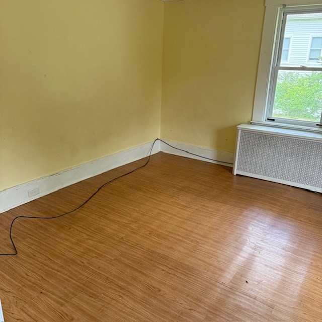 254 Rice Avenue, Unit 1 Northborough, MA 01532 - Photo 8 of 9 a view of an empty room and window