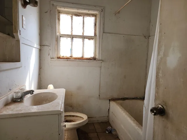 an empty room with windows