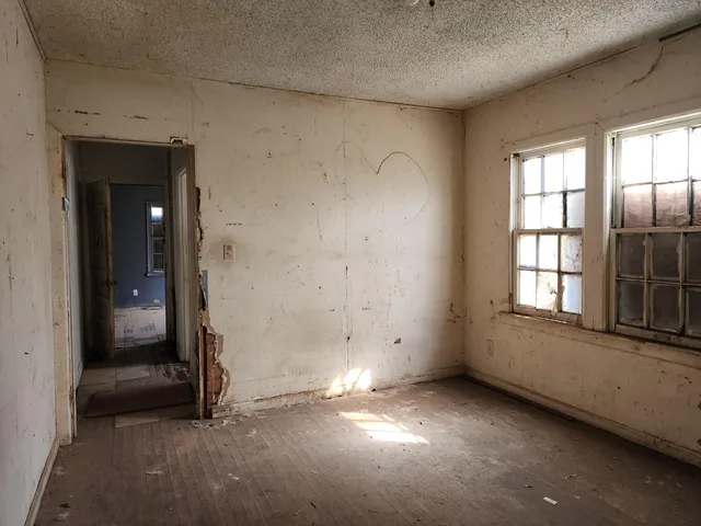 a bathroom with a sink toilet and a mirror