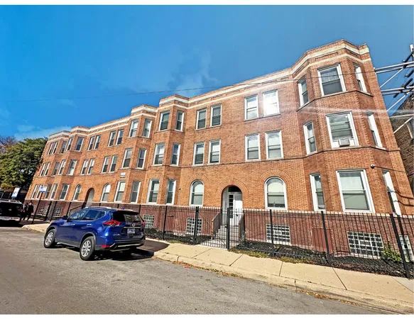 a car parked in front of a building