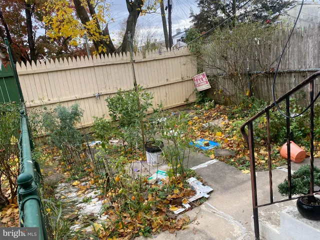 a view of a pathway with a park