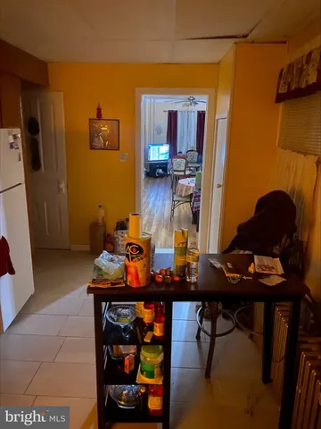 a room with furniture and air hockey table