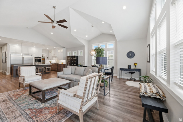 2109 Sunflower Lane Mapleton, UT 84664 - Photo 21 of 43 Gourmet Kitchen Opens Seamlessly into the Great Room w/Fireplace & Plenty of Dining Space! Entrance to the Covered Deck and Backyard