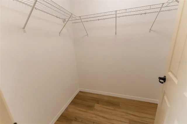 a view of a room with racks on the wall