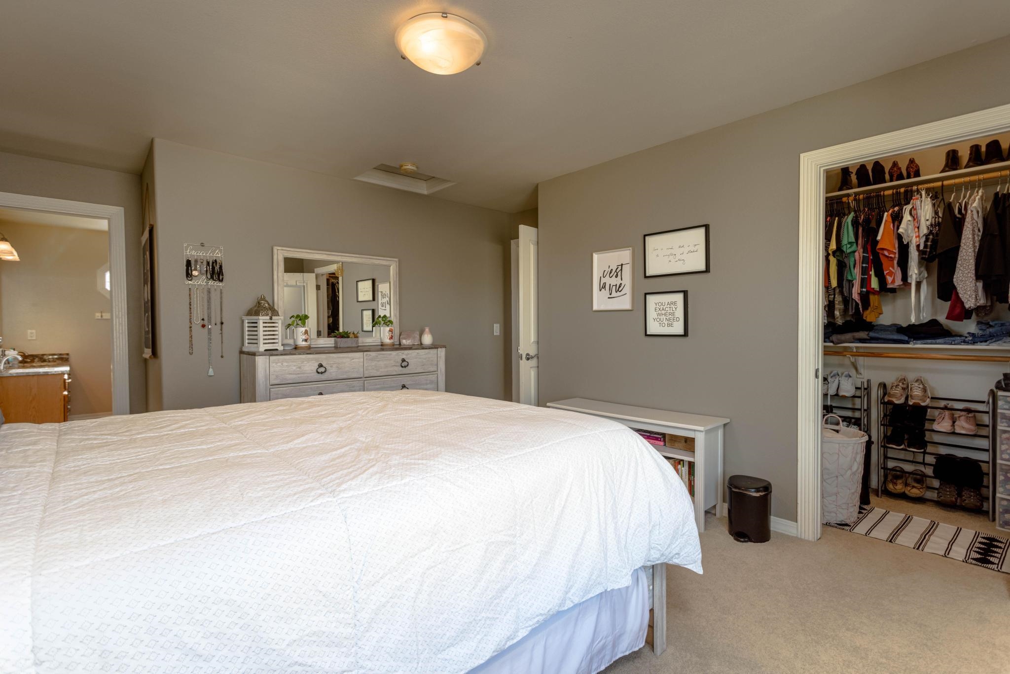 1168 Windsor Park Drive Fruita, CO 81521 - Photo 21 of 41 a bedroom with a bed and closet