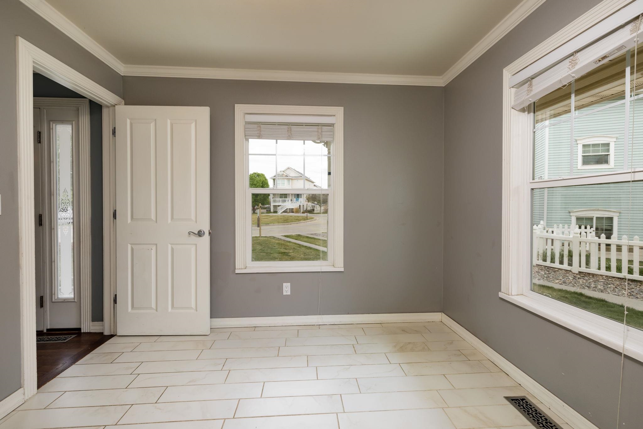 1168 Windsor Park Drive Fruita, CO 81521 - Photo 24 of 41 a view of an empty room with a window