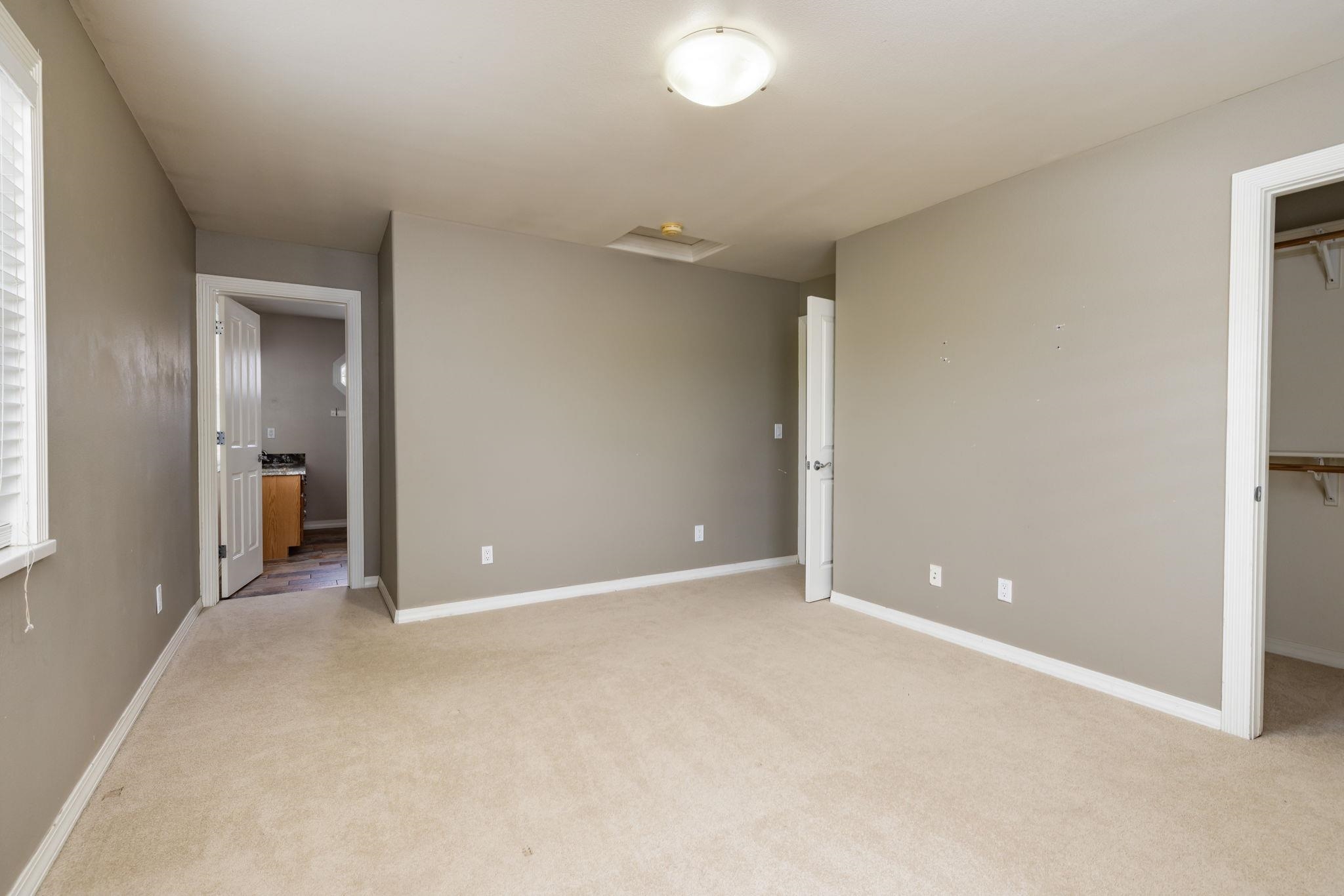 1168 Windsor Park Drive Fruita, CO 81521 - Photo 28 of 41 wooden view of an empty room