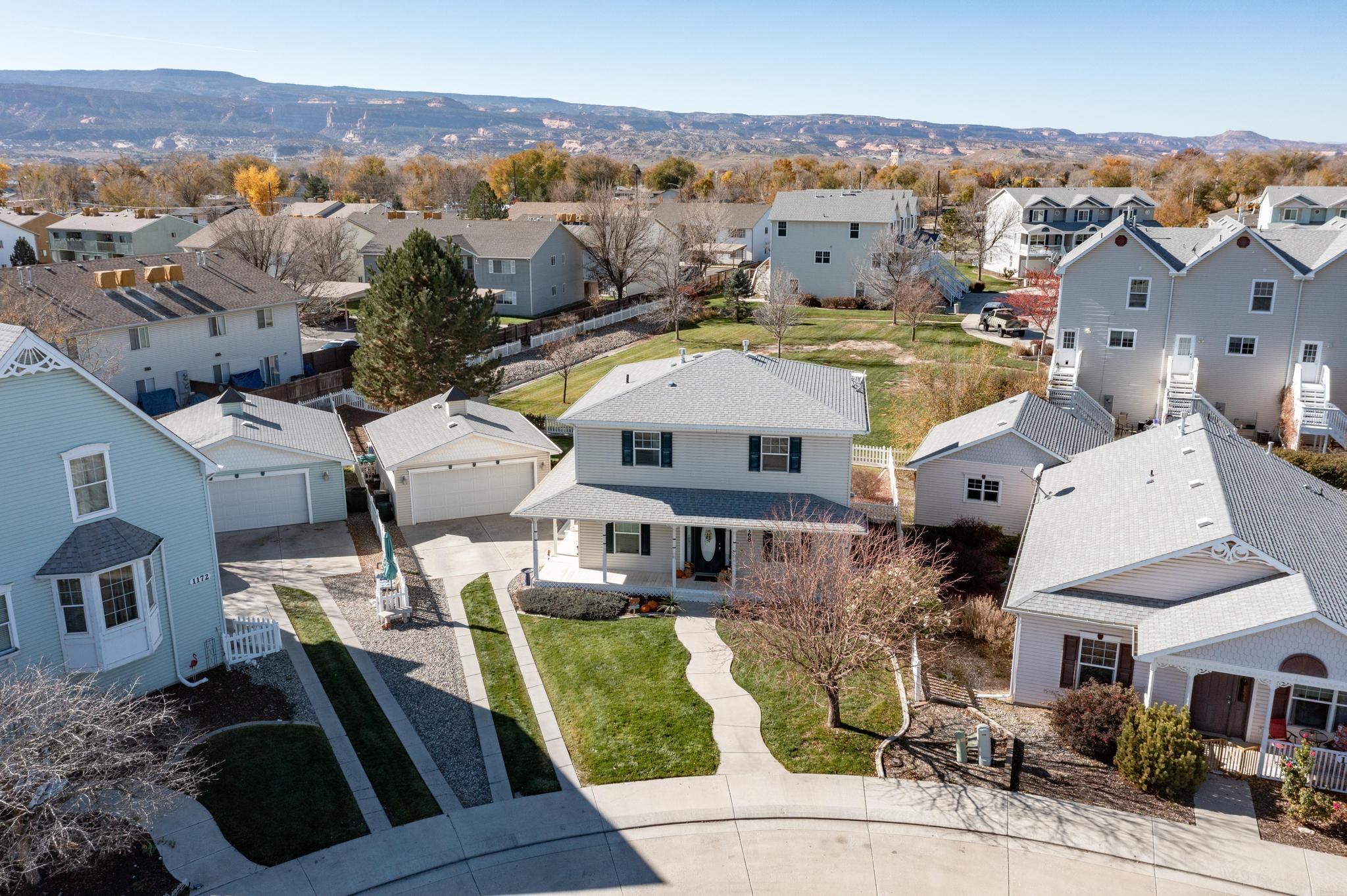 1168 Windsor Park Drive Fruita, CO 81521 - Photo 40 of 41 an aerial view of residential houses with outdoor space