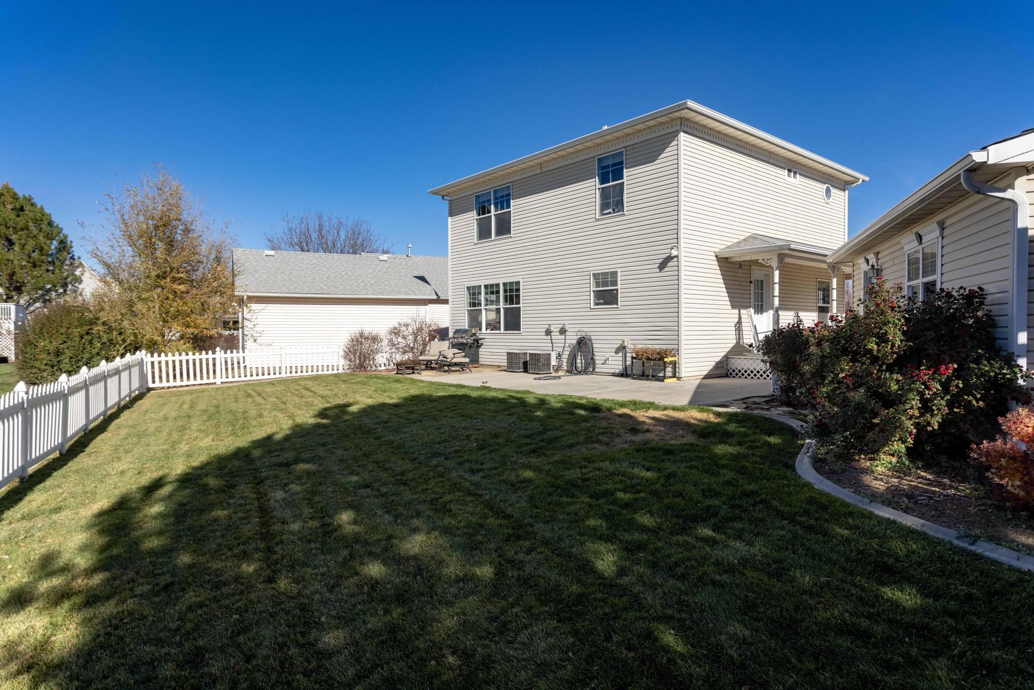 1168 Windsor Park Drive Fruita, CO 81521 - Photo 4 of 41 a view of a house with backyard and garden