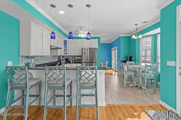 a view of a dining room with furniture
