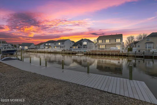 a view of a lake with a houses