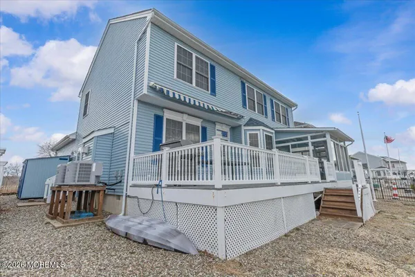 a front view of a house with two windows