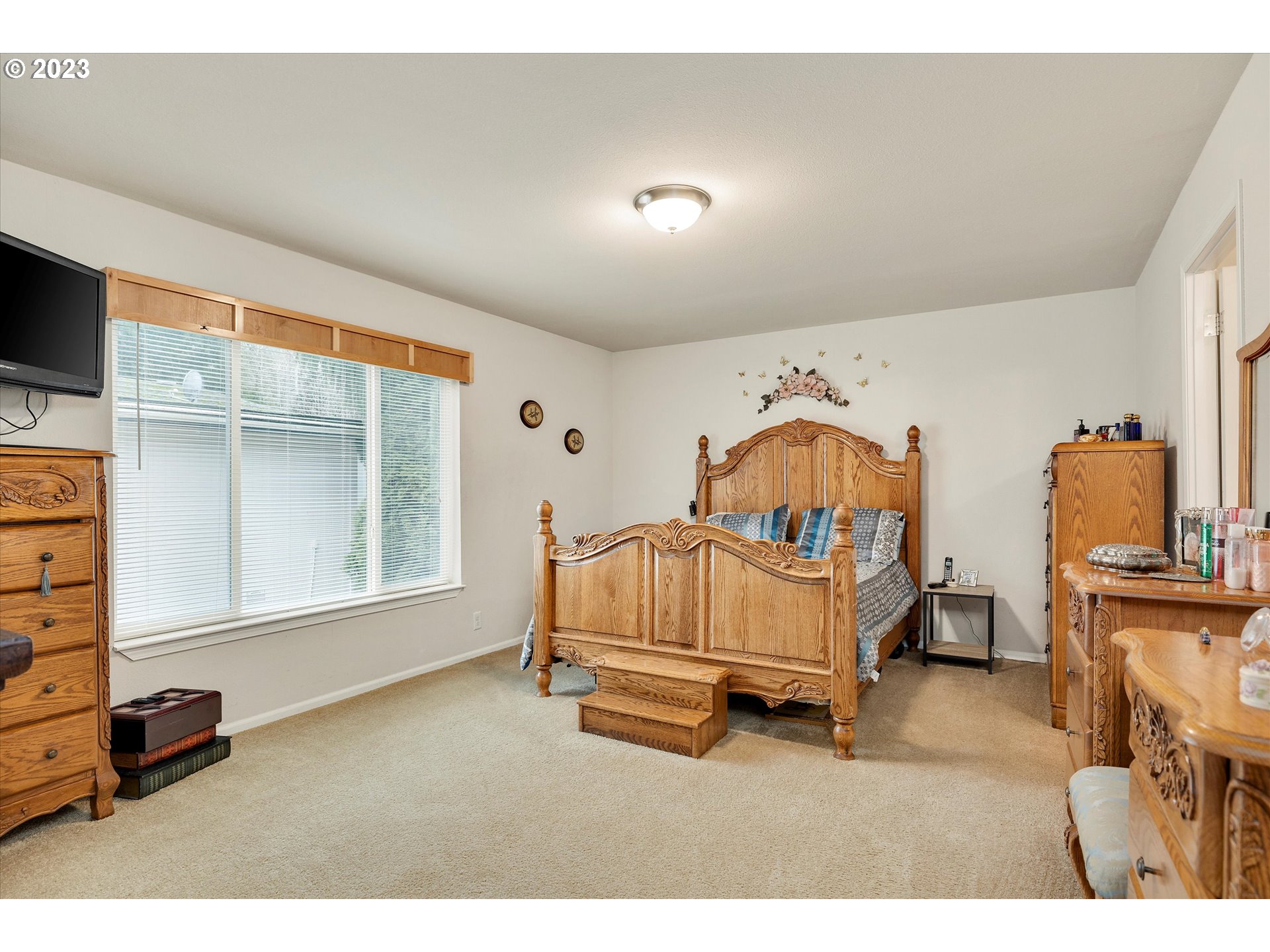 25222 East Welches Road, Unit 46 Welches, OR 97067 - Photo 15 of 30 a bedroom with a bed and a window