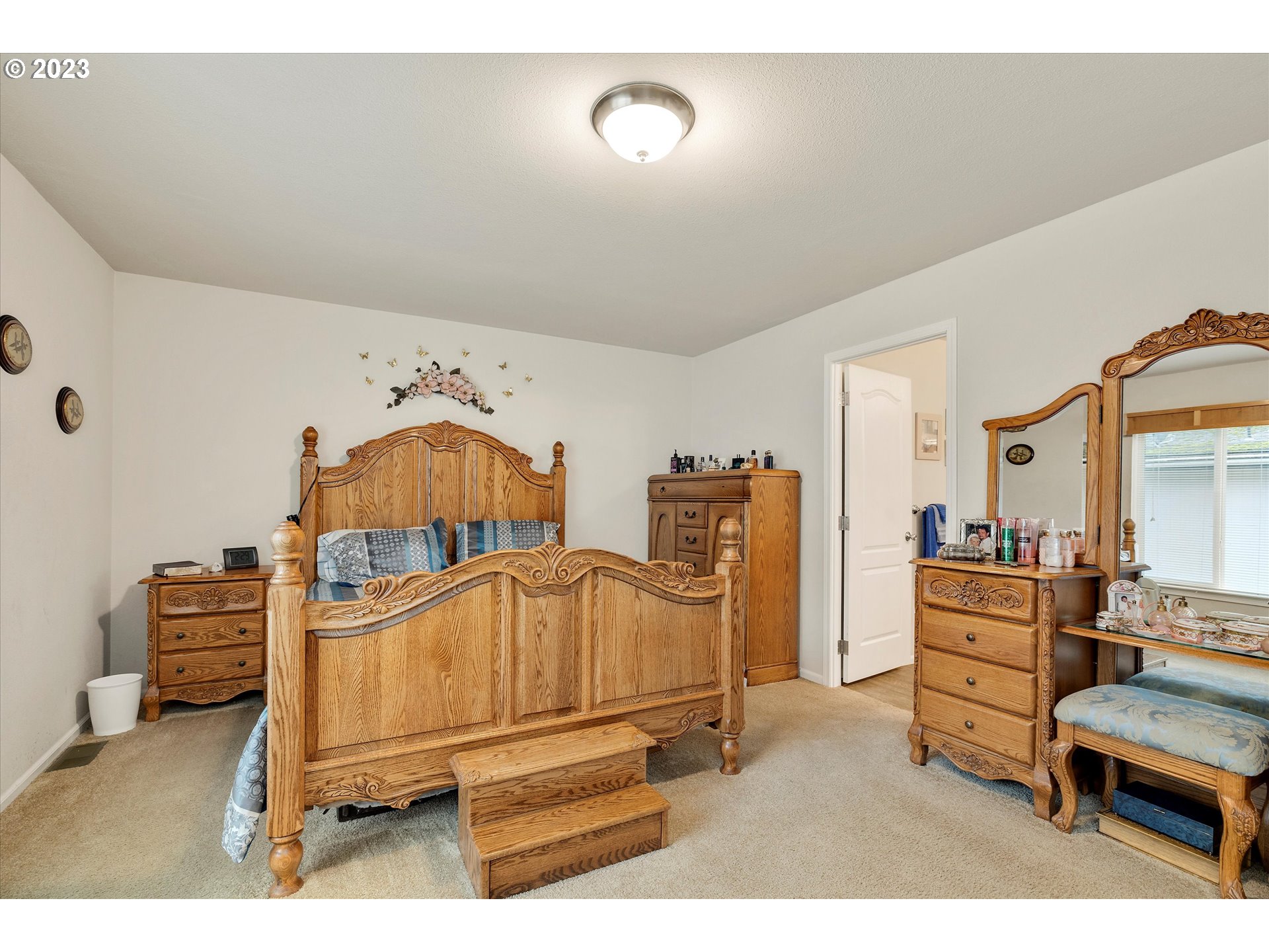 25222 East Welches Road, Unit 46 Welches, OR 97067 - Photo 16 of 30 a living room with furniture and a dresser