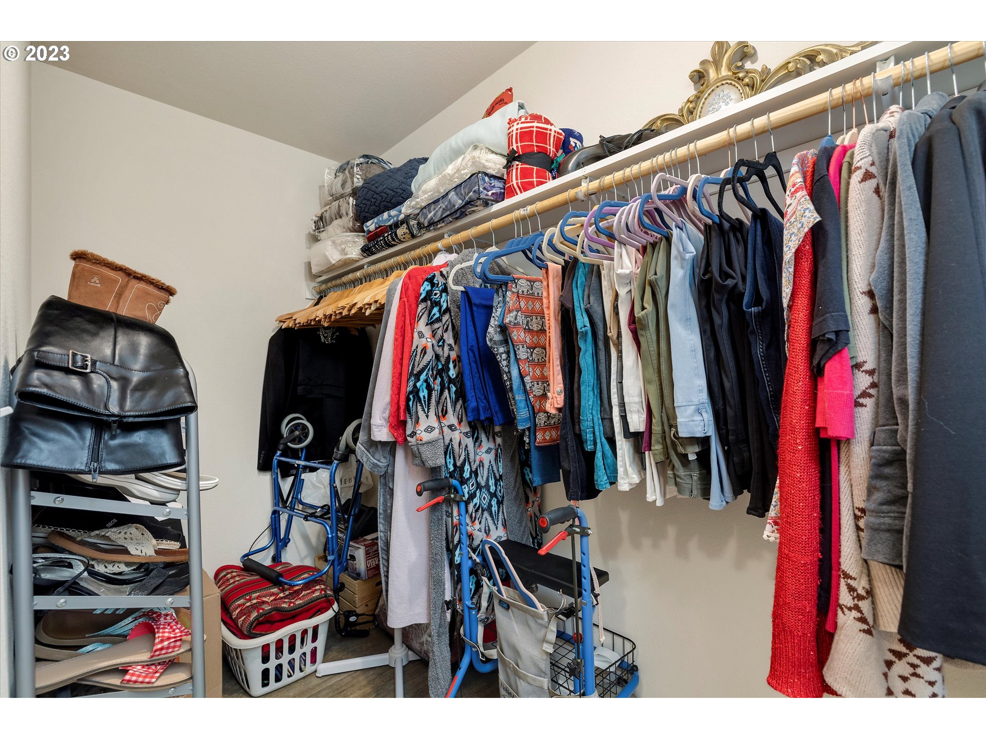 25222 East Welches Road, Unit 46 Welches, OR 97067 - Photo 18 of 30 a view of walk in closet with clothes and shoes