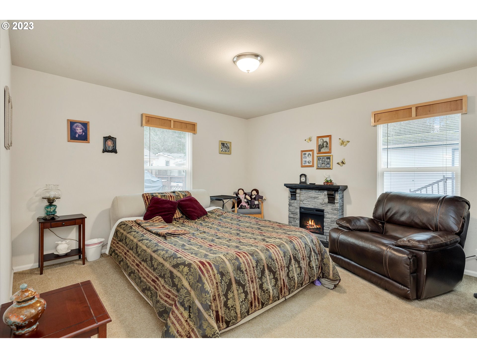 25222 East Welches Road, Unit 46 Welches, OR 97067 - Photo 19 of 30 a bedroom with two beds and a couch
