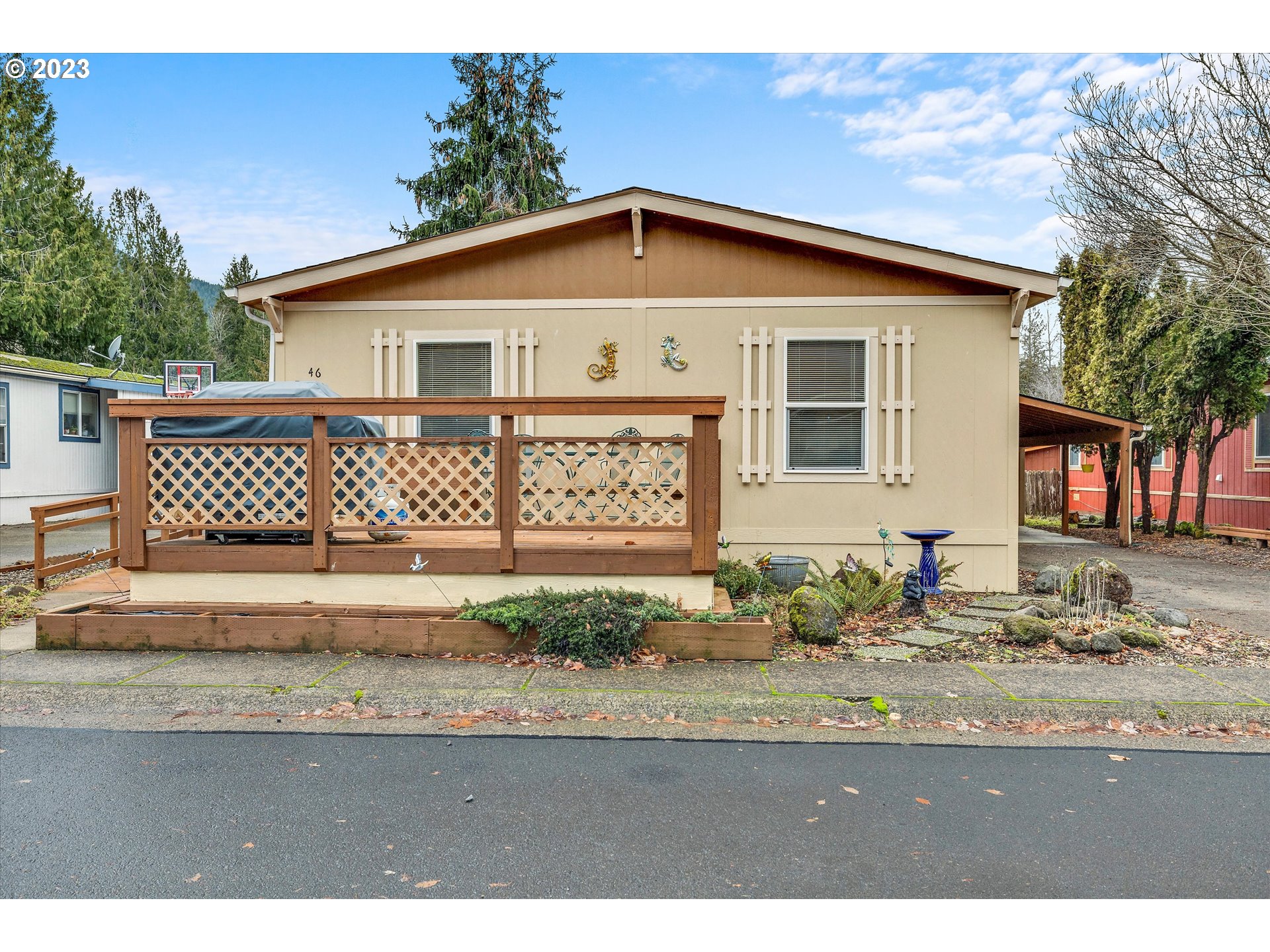 25222 East Welches Road, Unit 46 Welches, OR 97067 - Photo 2 of 30 a front view of a house with a yard