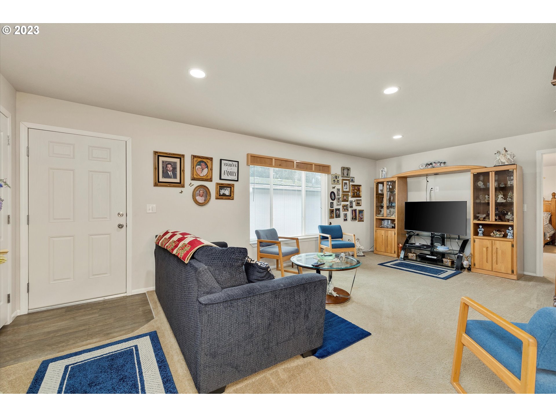 25222 East Welches Road, Unit 46 Welches, OR 97067 - Photo 5 of 30 a living room with furniture and a flat screen tv