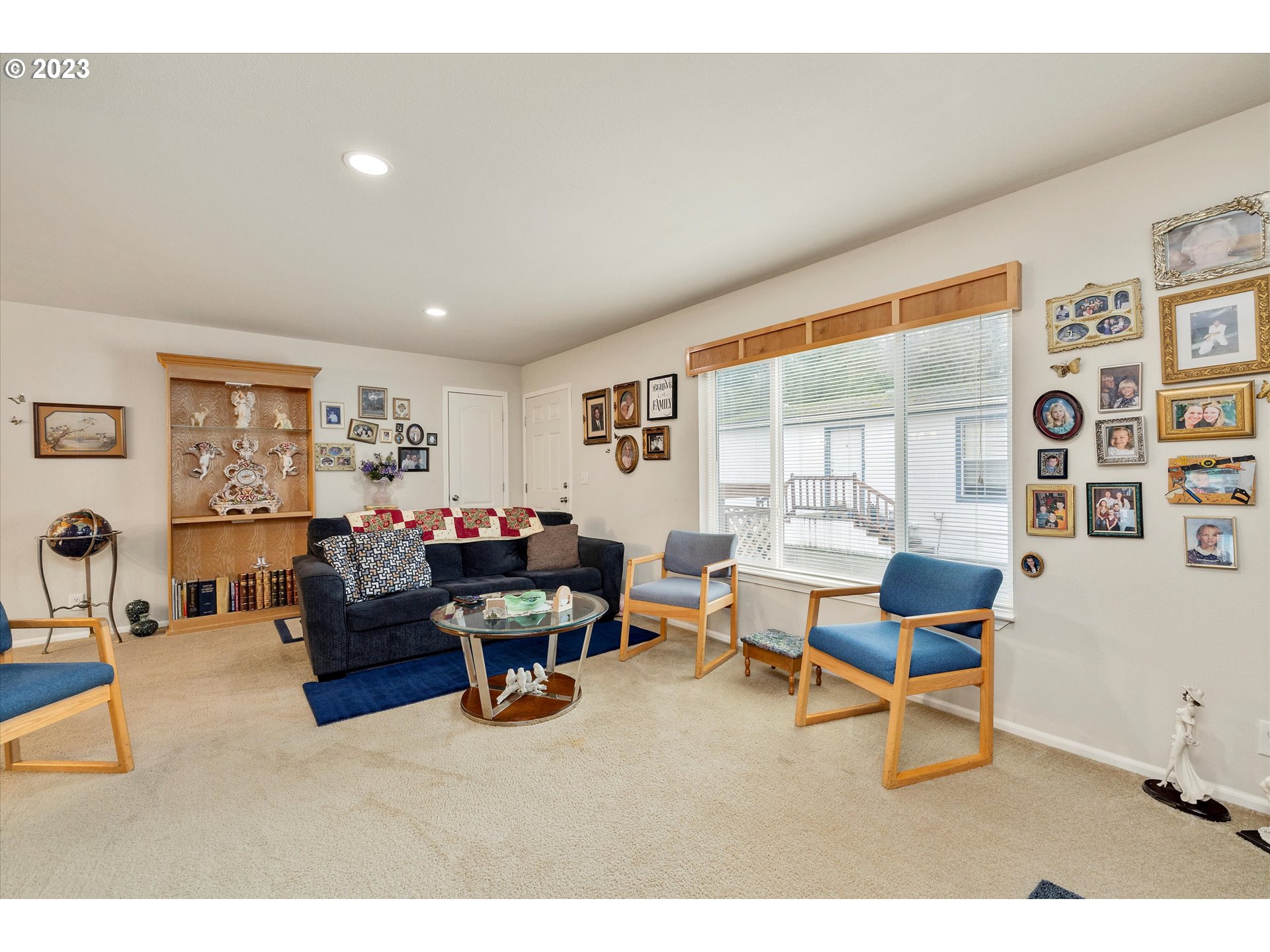 25222 East Welches Road, Unit 46 Welches, OR 97067 - Photo 6 of 30 a living room with furniture and a large window