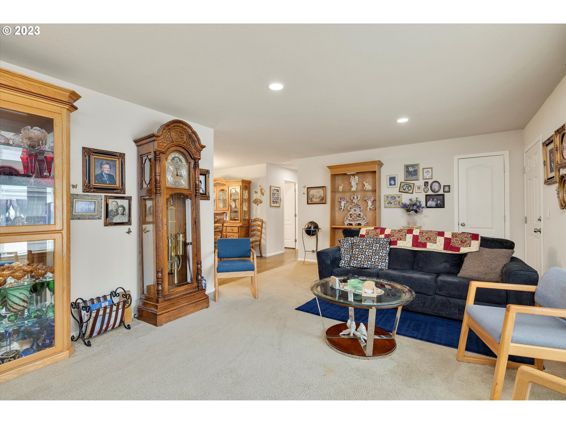 25222 East Welches Road, Unit 46 Welches, OR 97067 - Photo 7 of 30 a living room with furniture a window and gym equipment