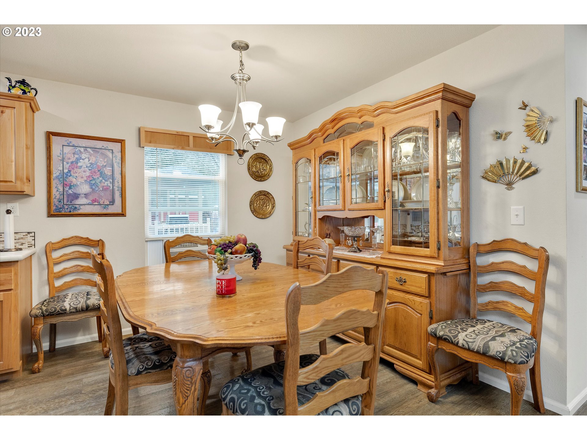 25222 East Welches Road, Unit 46 Welches, OR 97067 - Photo 9 of 30 a view of a dining room with furniture and chandelier