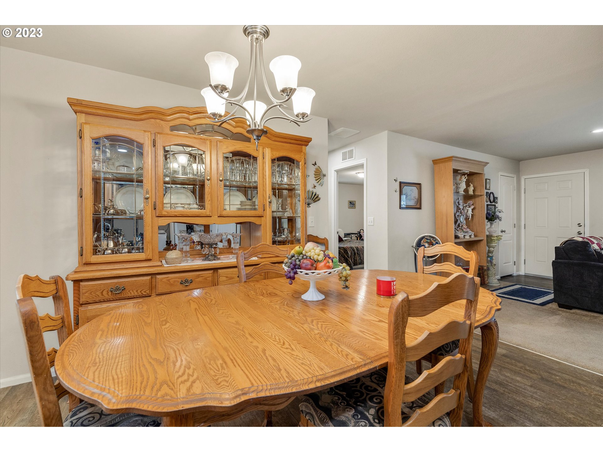 25222 East Welches Road, Unit 46 Welches, OR 97067 - Photo 10 of 30 a view of a dining room with furniture and wooden floor